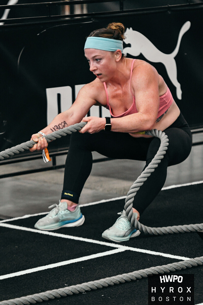 HYROX athlete working through a station